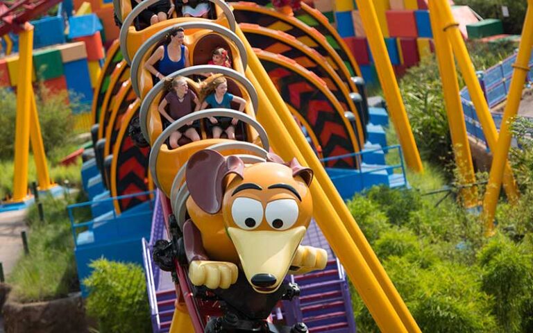 dog themed coaster with riders on slinky dog dash at hollywood studios walt disney world resort orlando