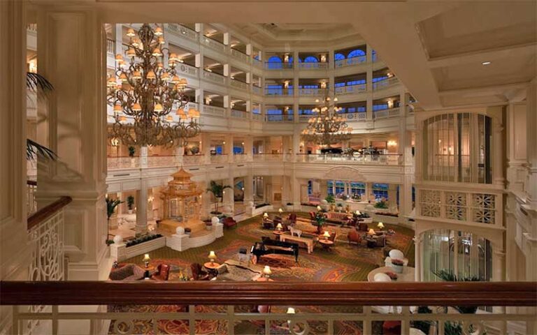 elegant lobby with atrium and elevator at disneys grand floridian resort spa walt disney world orlando