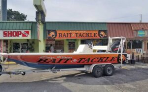 exterior of storefront with boat on trailer at bay pines bait tackle st pete