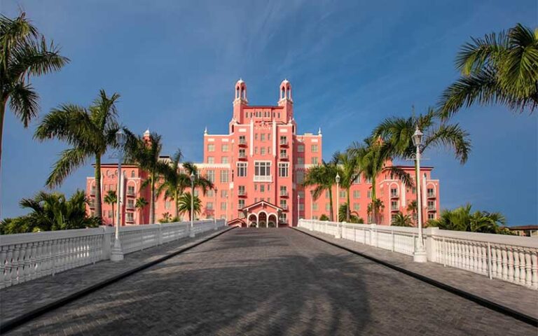 exterior front entrance view of pink hotel with driveway at the don cesar st pete beach