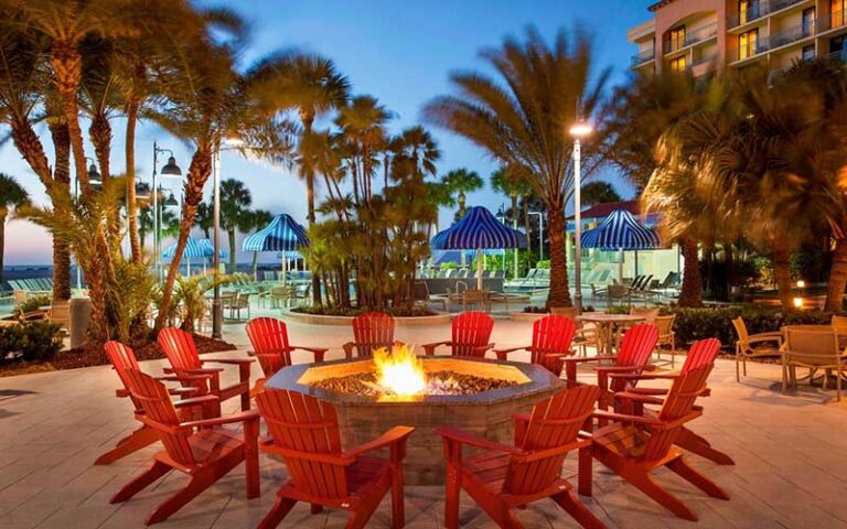 fire pit with seating outside at night at sheraton sand key resort clearwater beach