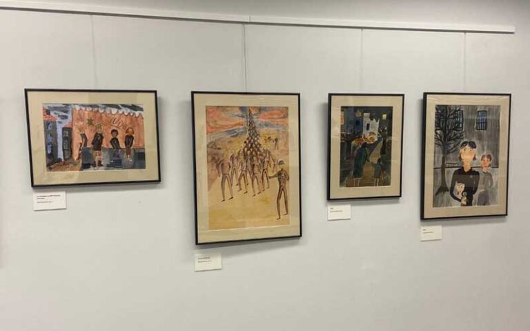 four works of art on exhibit wall at the florida holocaust museum st pete