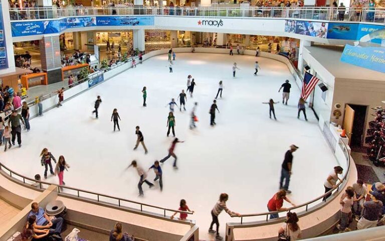 ice skating rink in mall center with skaters and macys sign at countryside mall clearwater