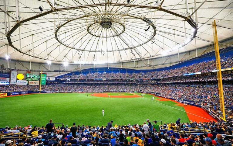 interior of domed stadium with baseball game and crowded stands at tropicana field st pete