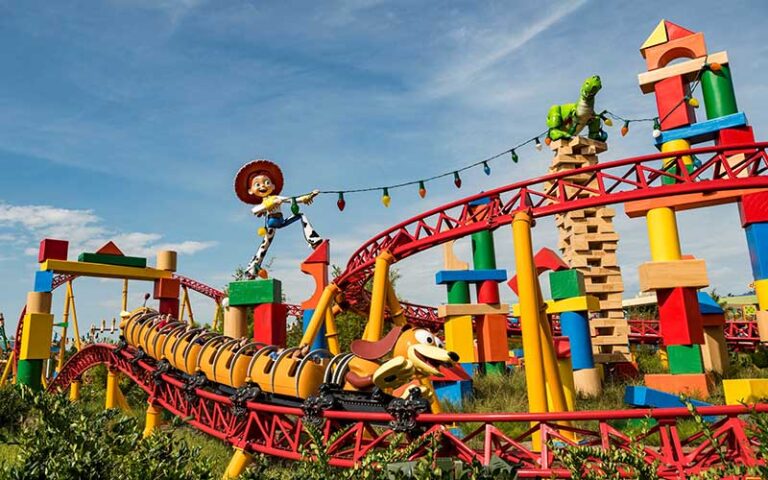 jesse character with giant toys on slinky dog dash at hollywood studios walt disney world resort orlando