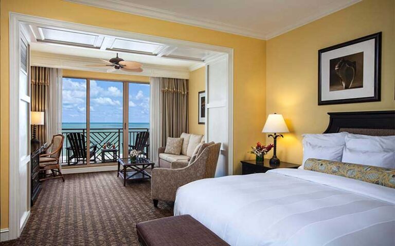 king size bed suite with balcony ocean view at sandpearl resort clearwater beach