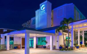 lighted hotel exterior at night at winter the dolphins beach club clearwater