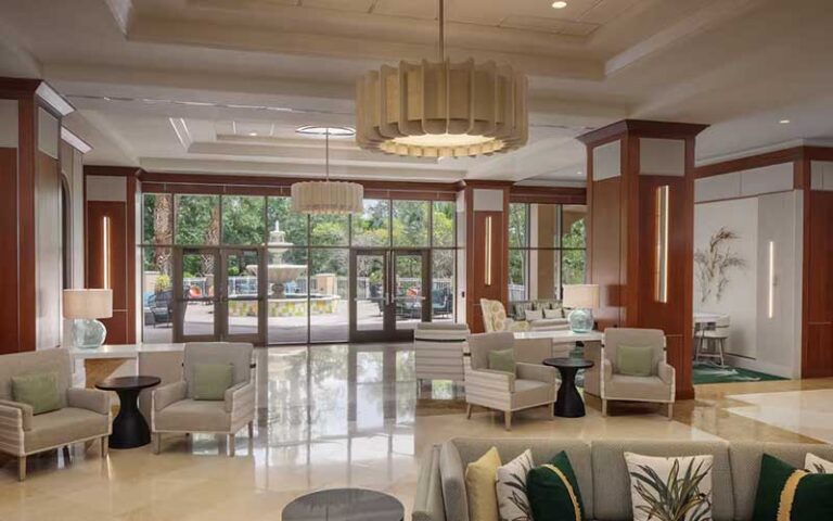 lobby with seating and wood columns at hilton st petersburg carillon park