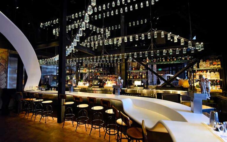 lounge bar with hanging glasses at morimoto asia at disney springs orlando