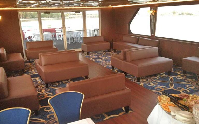 lower deck with lounge seating at starlite sapphire dining yacht cruise st pete beach