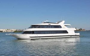 luxury yacht in bay with clear blue sky at starlite sapphire dining yacht cruise st pete beach