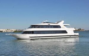 luxury yacht in bay with clear blue sky at starlite sapphire dining yacht cruise st pete beach