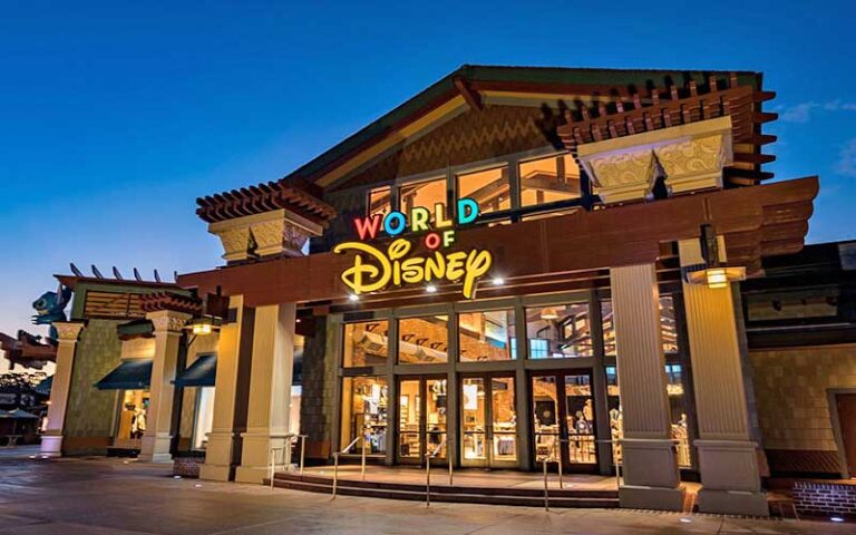 night exterior store front at world of disney store disney springs orlando