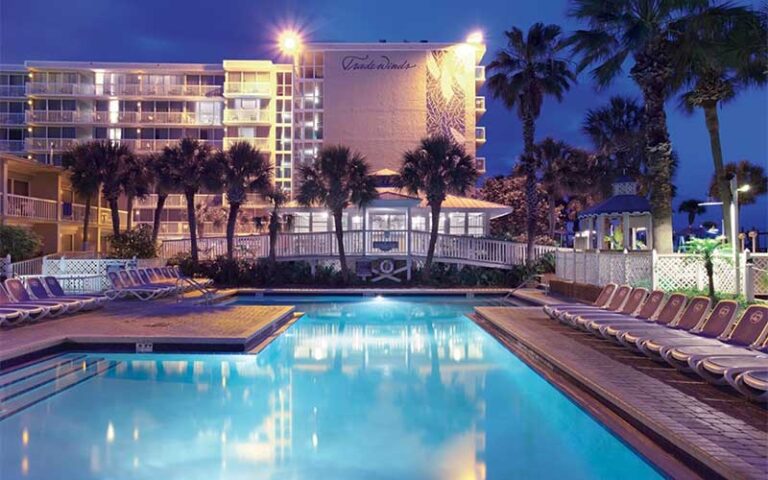 night view of pool area with resort at island grand resort st pete beach