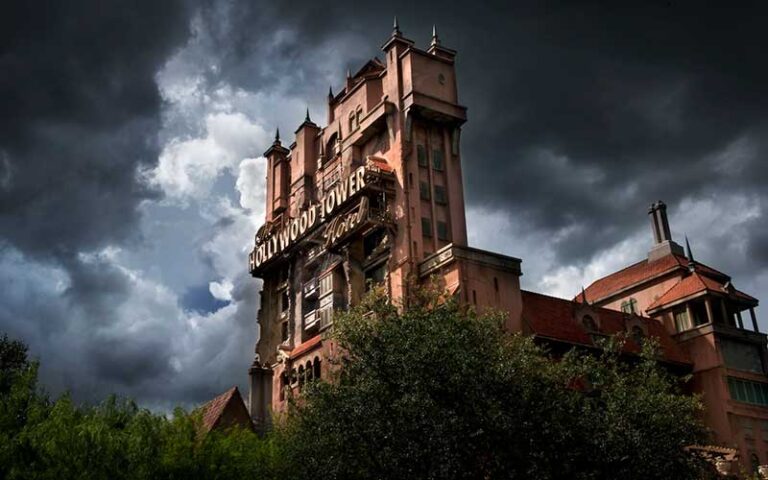 night view of ride building with dark clouds twilight zone tower of terror at hollywood studios walt disney world resort orlando