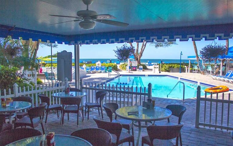 patio pool area with ocean view at rumfish beach resort st pete