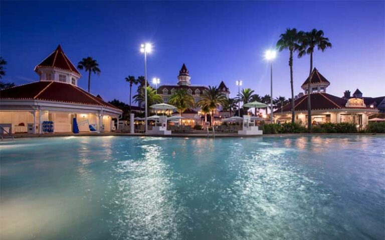 pool at night with lighting at disneys grand floridian resort spa walt disney world orlando