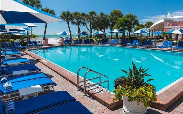 rectangular pool with lounges cabanas and ocean view at the don cesar st pete beach