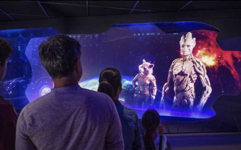 riders watching screen with groot at guardians of the galaxy cosmic rewind at epcot walt disney world resort orlando