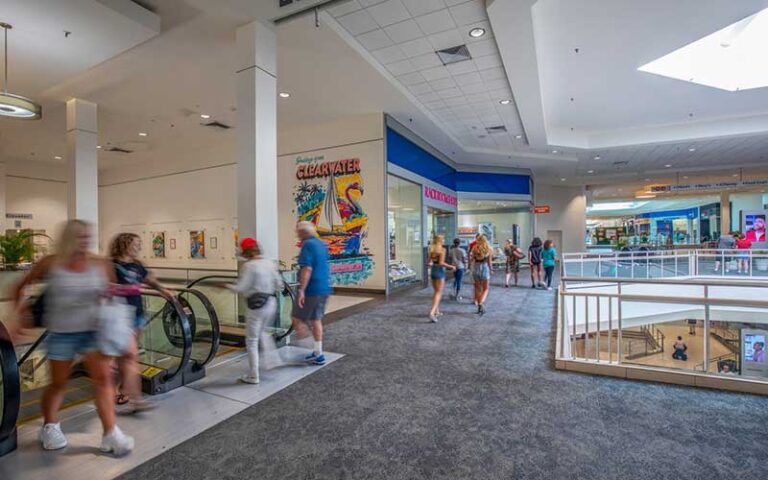 second floor of mall with mural escalator and storefronts at countryside mall clearwater