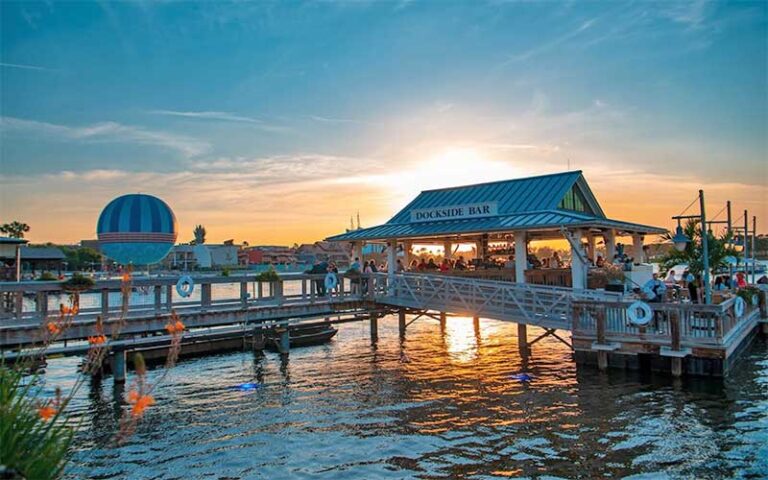 sunset view of dockside bar with balloon at the boathouse at disney springs orlando