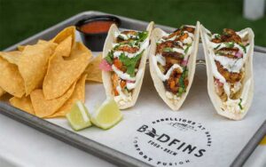 tray with three tacos and chips at badfins food drink clearwater beach