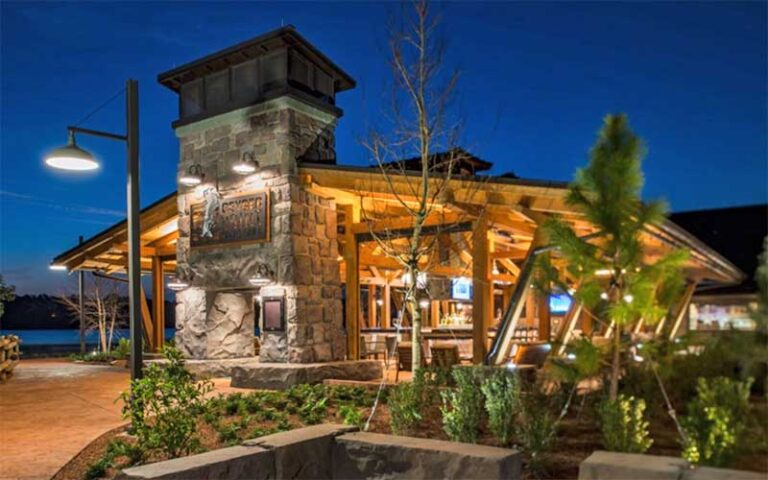 cabin style pool bar at night at wilderness lodge walt disney world resort orlando