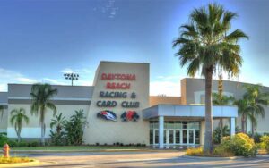 daytime front exterior with entrance and palm tree at daytona beach racing card club