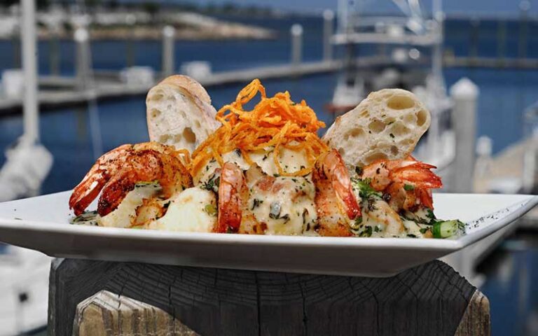 grits a ya ya specialty entree on dock post at the fish house pensacola