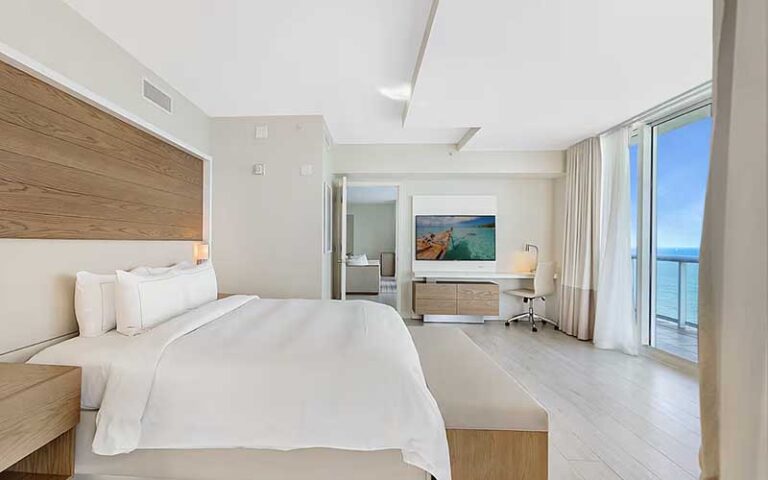 king size bed penthouse with balcony ocean view at hilton fort lauderdale beach resort