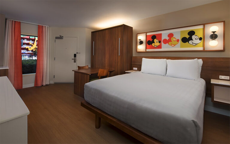 king size bed suite with mickey art at pop century resort walt disney world orlando