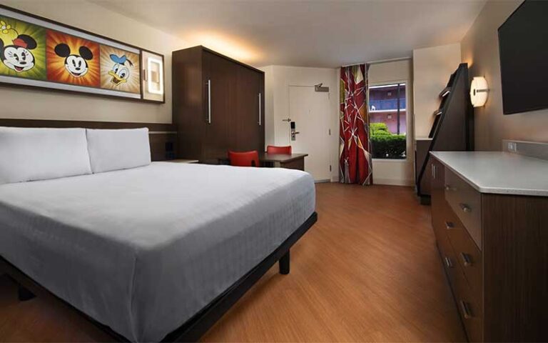 king size bed suite with mickey decor at all star movies resort walt disney world orlando