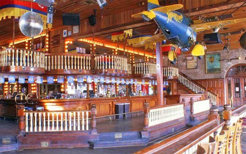 multi level dance floor bar with rails at seville quarter pensacola