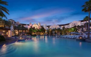 night view across pool of resort at hard rock hotel at universal orlando
