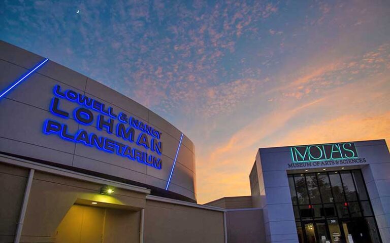 planetarium building at night with moon at museum of arts sciences daytona beach