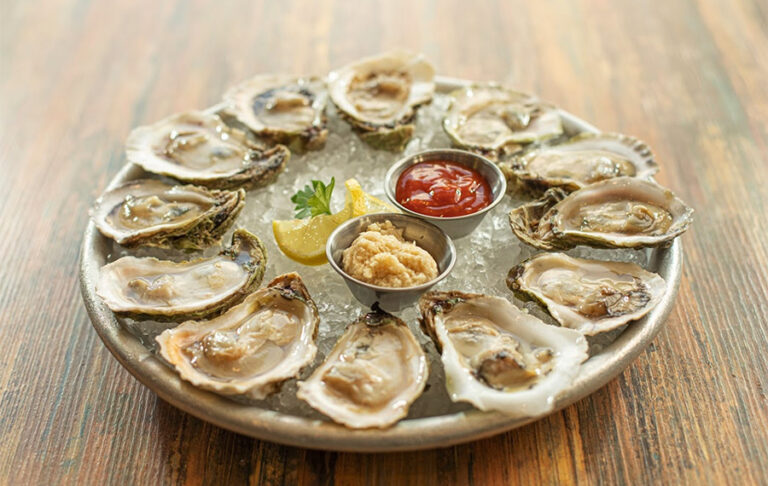 platter of iced oysters with sauces at harborside winter haven