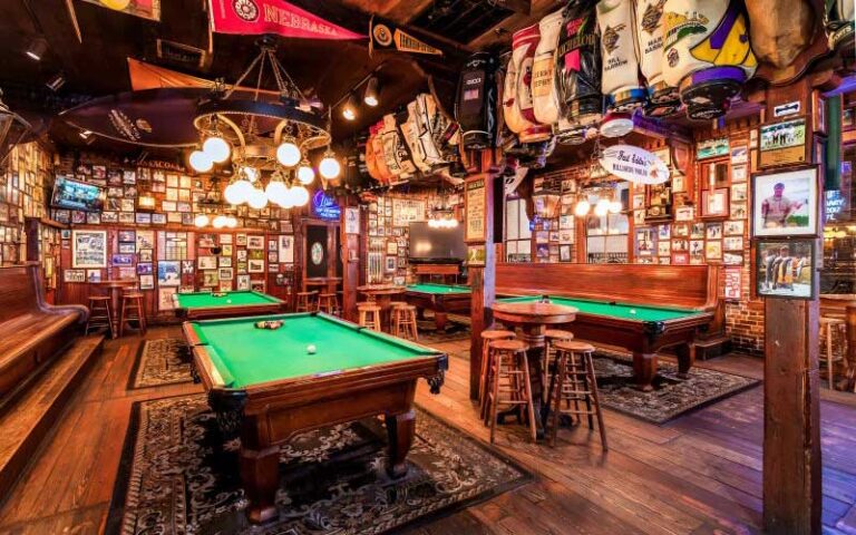 pool tables in room with antique sports theme at seville quarter pensacola