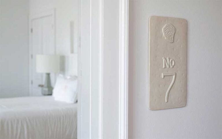 room entrance with chic decor at oyster bay boutique hotel pensacola