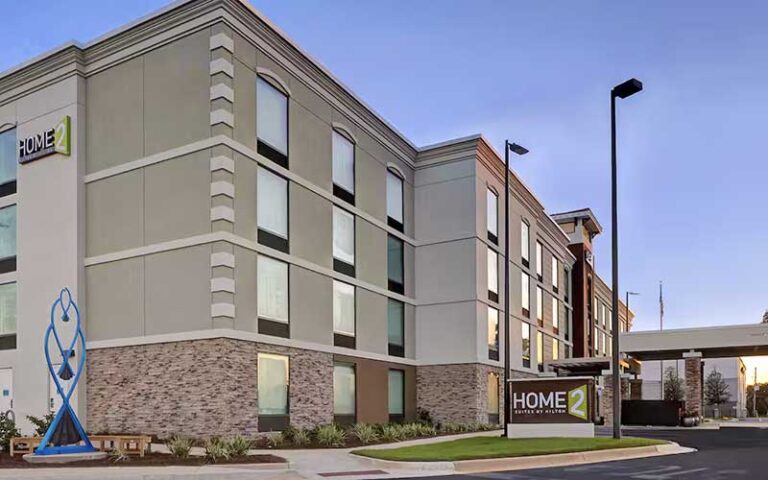 side exterior of hotel at twilight at home2 suites by hilton gulf breeze pensacola area