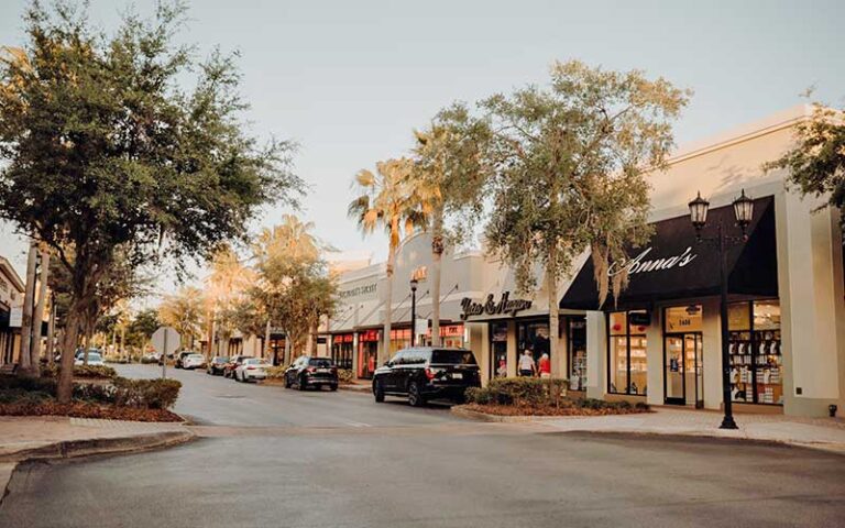 street lined with shops and parking at lakeside village lakeland
