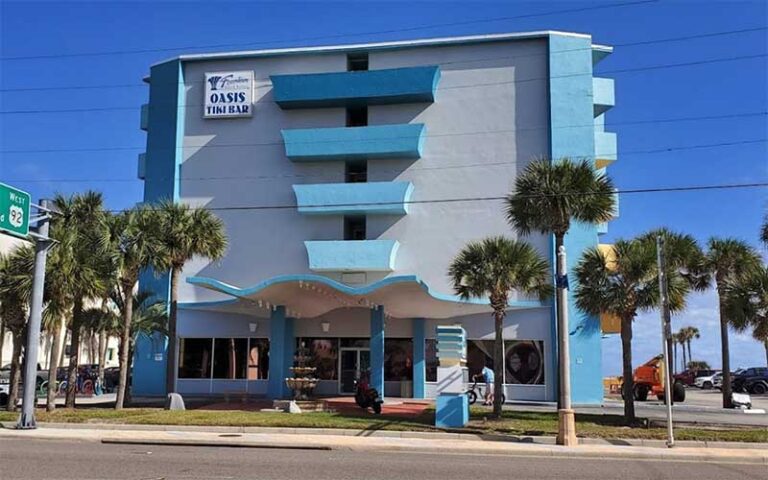 street view of hotel with signs at fountain beach resort daytona
