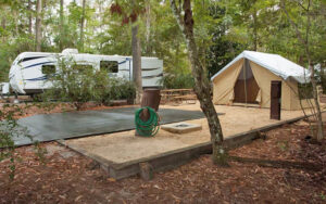 tent and trailer pads with hookups in woods at campsites at fort wilderness resort walt disney world orlando