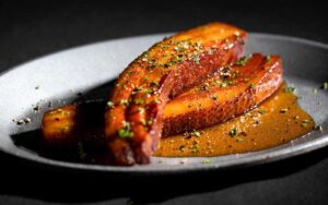 thick cut bacon entree at hyde park prime steakhouse daytona beach