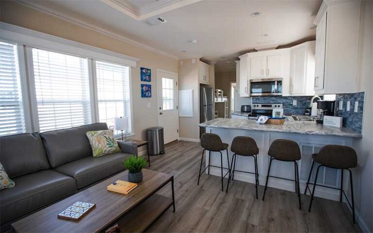 kitchen and living area in cabana cabin at camp margaritaville auburndale