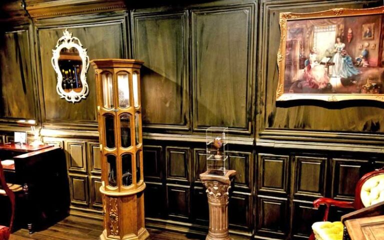 room with period decor and paintings at the ocala escape