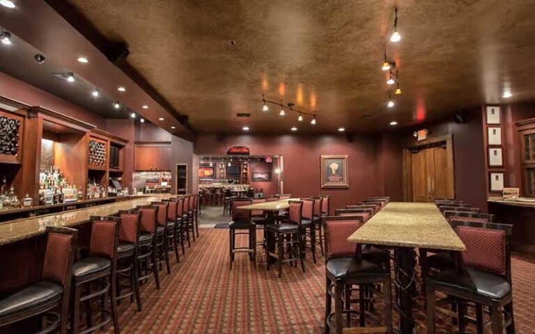 bar area lounge with tables at firefly panama city beach