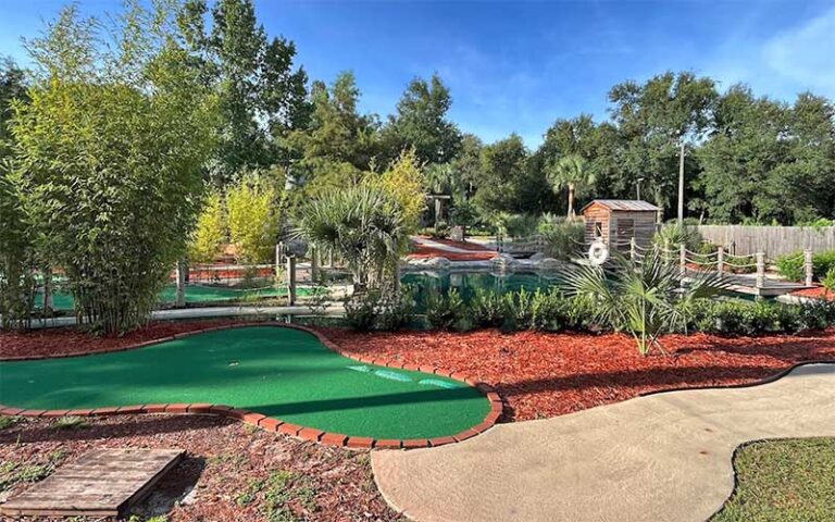 outdoor mini golf hole with pathway at skate station funworks gainesville