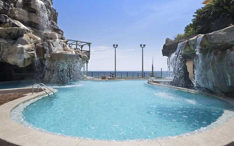 pool with grotto waterfalls at days inn by wyndham panama city beach ocean front