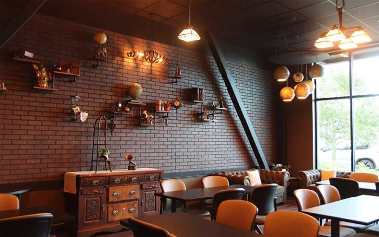 swanky period piece lounge with tables at escapology gainesville