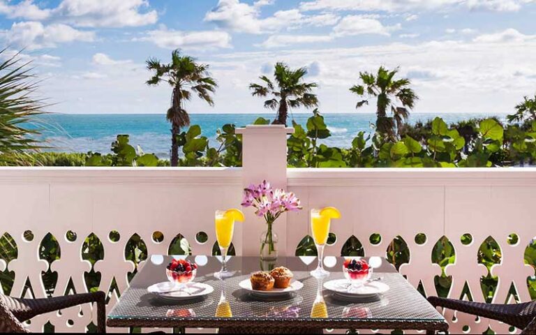 breakfast table seating on patio with ocean view at port dhiver bed breakfast melbourne beach